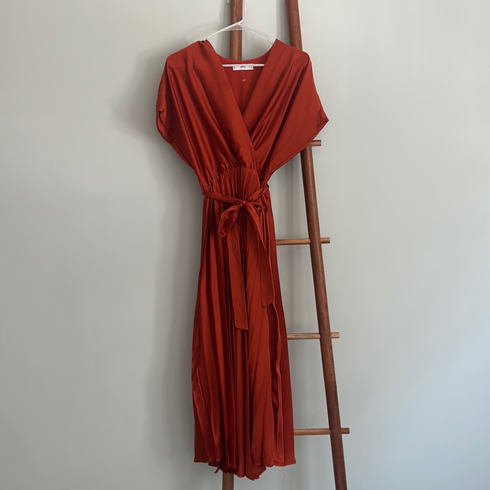 Orange pleated dress